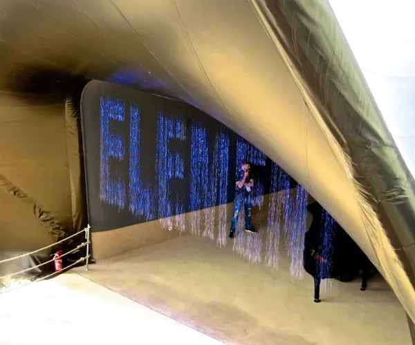 Digital rain curtain spelling the word Element in falling water