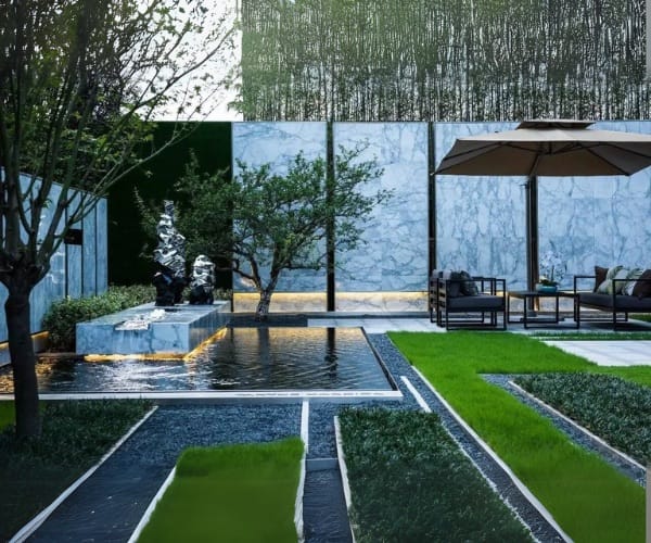Zen garden reflection pool with marble walls and an outdoor lounge