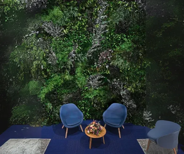 Preserved moss and foliage wall behind a seating area in an interior lounge