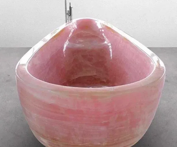 Bathtub carved from a single block of rose onyx