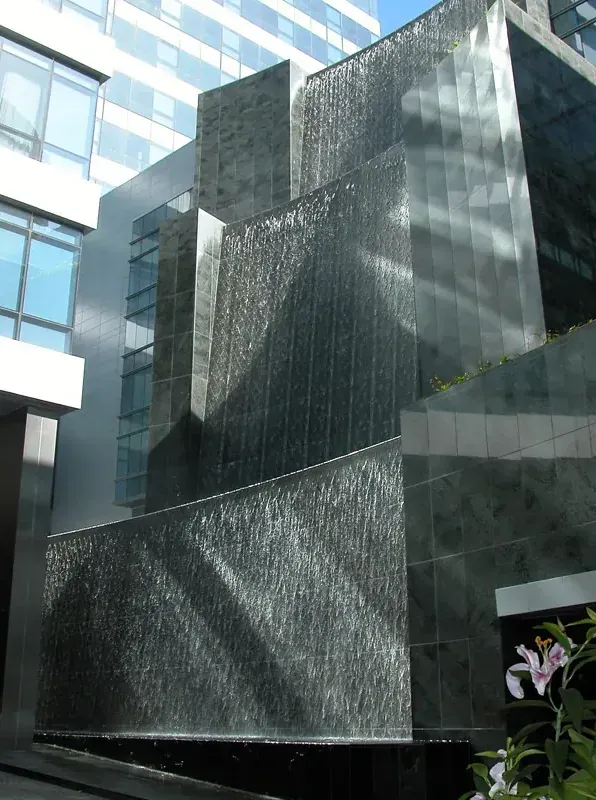 Granite waterwall at the Four Seasons Miami arrival court